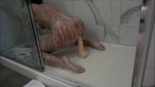 HOT AMATEUR TAKES a CREAMY SHOWER WHILE RIDING HER 12 INCH DILDO TO ORGASM